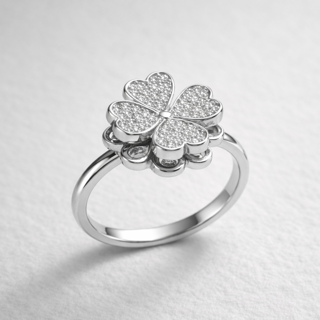 Silver anxiety spinner flower ring on a light gray background