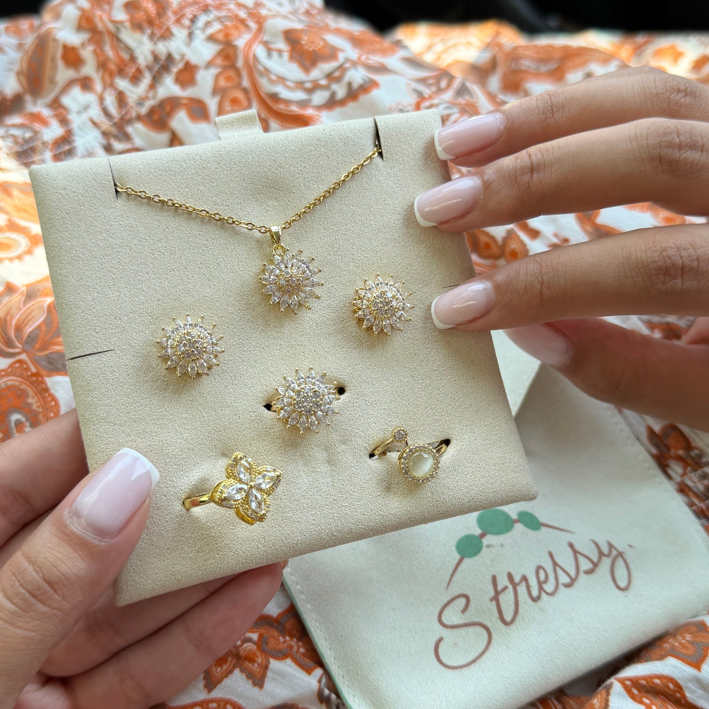 Stressy tulip ring brass lifestyle image.