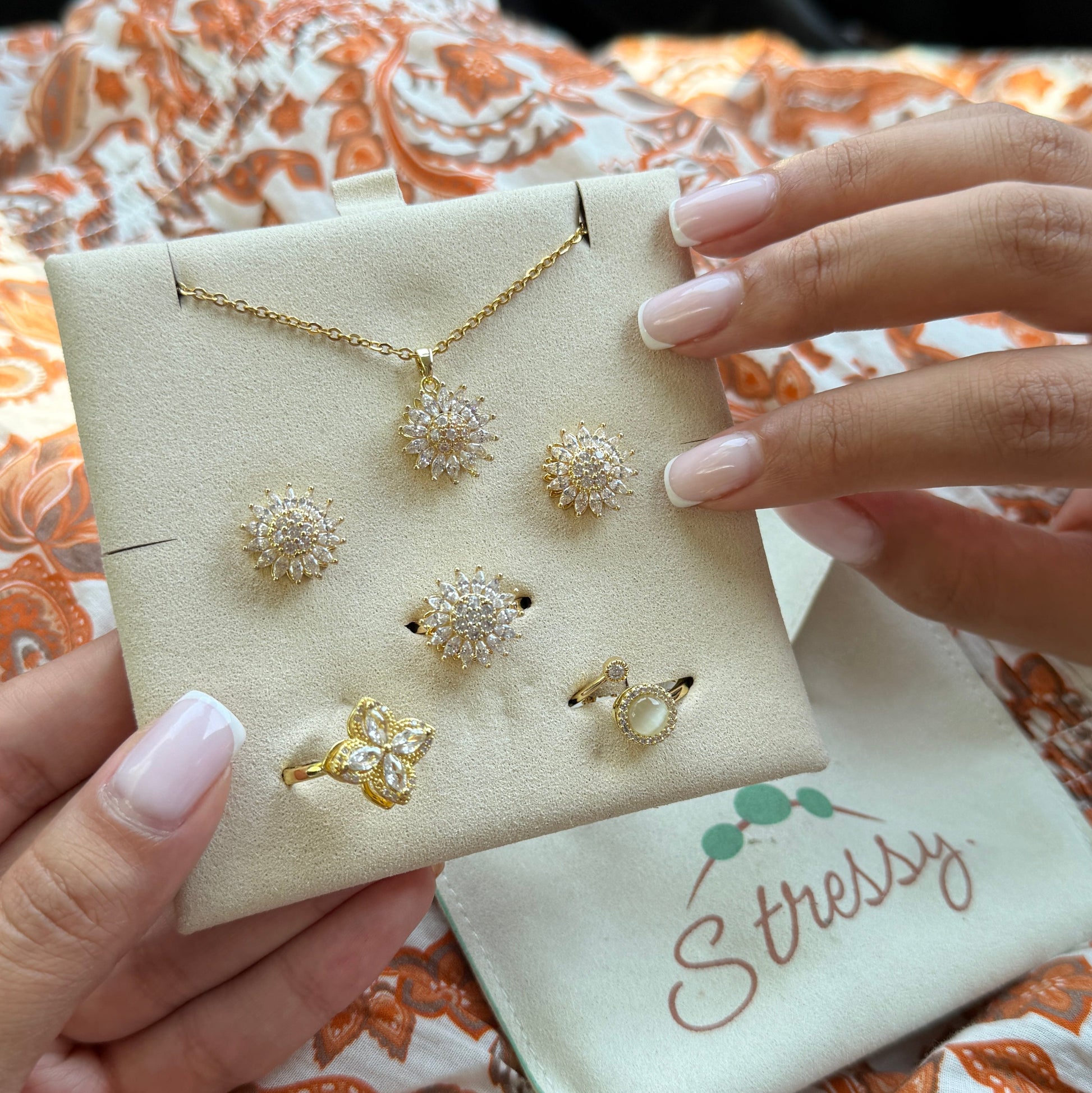 Stressy tulip ring brass lifestyle image.